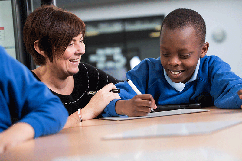 photo of teacher with student